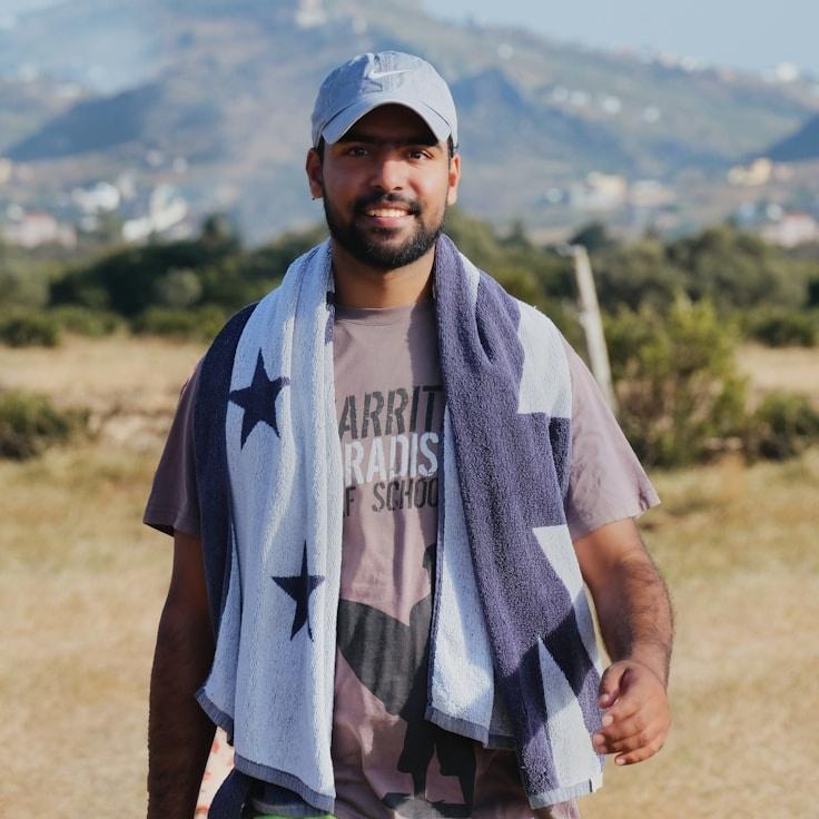 Kaveri Mehta, Lead Design Curator at ClearPulseDomain, reviewing corporate floral arrangements